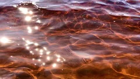 Waves of the red lake. Video stock 130752110