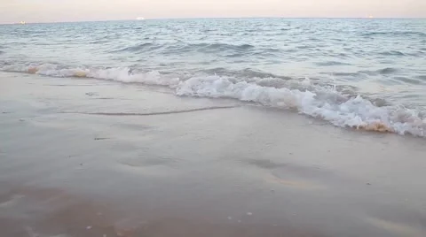 The waves of the Red Sea rolled on a sandy beach. Stock Footage 47264301