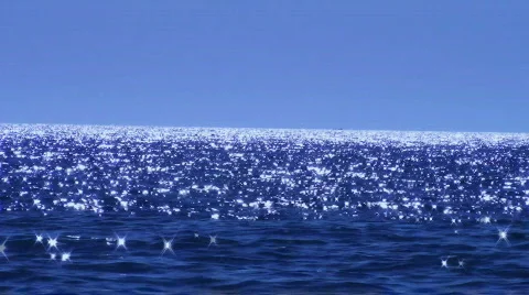 Waves reflecting the sun shine Stock Footage 489378