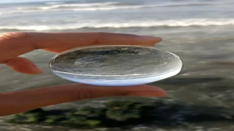 Waves reflection on a lensball Stock Footage