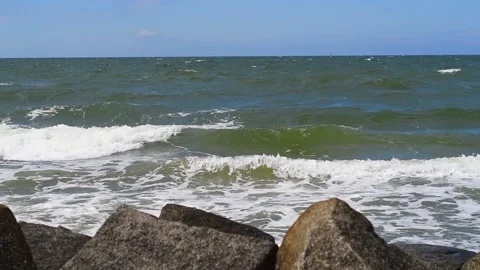 Waves rinse to the beach on the baltic sea Video stock 142212796