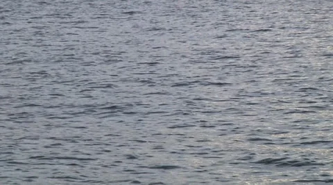 Waves ripple overcast zoomout Stock Footage 33255104