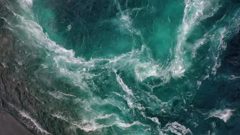 Waves from the river and sea collide during high and low tides, creating pow Stock Footage 291738951