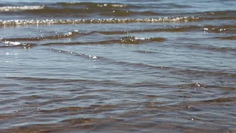 Waves in the river in the back lit, natural background Stock Footage 91242879