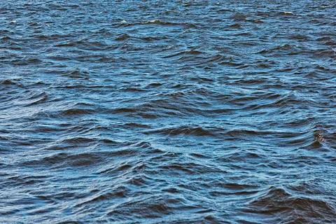 Waves on the river close-up as background Stock Photos