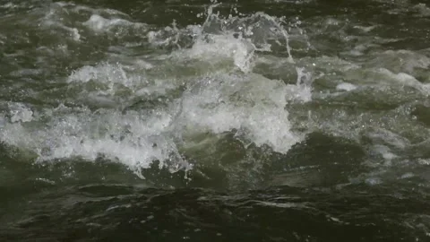 Waves of river flow over rocks Stock Footage 287293269