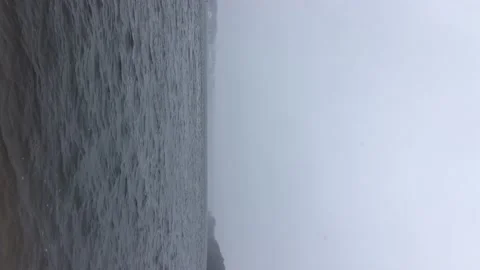 Waves on a river or lake in cold snowy weathe Stock Footage 153020198