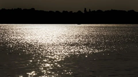 Waves on the river water on the sunset light Stock Footage 44751893