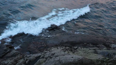 Waves on rock from above Video stock 37216572