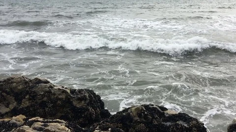 Waves On Rocks 2 Stock Footage 103111104