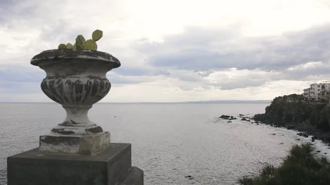 Waves on rocks in Aci Castello Acitrezza sicily Video stock 73302344