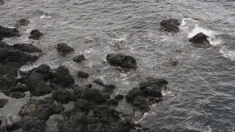 Waves on rocks in Acitrezza sicily Stock-Footage 73302189