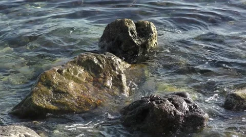 Waves rocks close up movement water sea ocean Stock Footage 57244377
