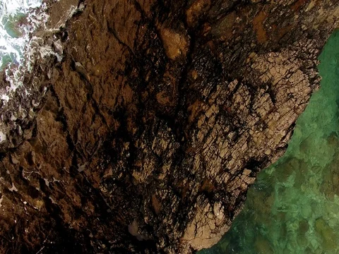 Waves on the rocks Stock Footage 73425632