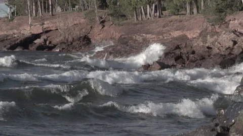 Waves on rocks Stock Footage 145147378