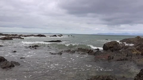 Waves on rocks Stock Footage 208852564