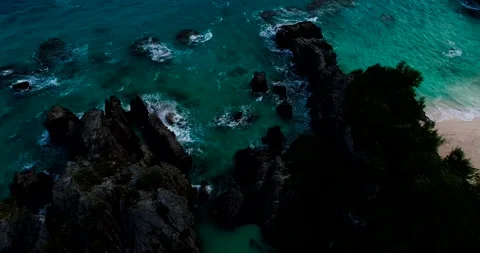 Waves on rocks Stock Footage 220541299