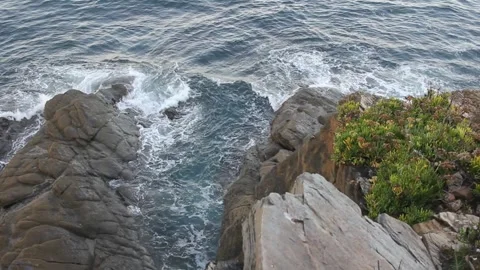 Waves in the rocks Stock Footage 254568365