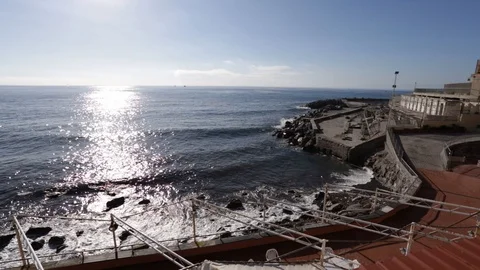 Waves on the rocks in front of the bathhouse Stock Footage 103435694