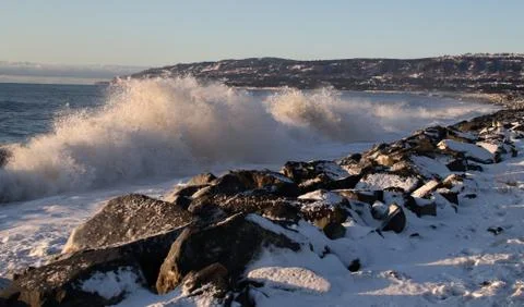 Waves on the rocks Stock Photos