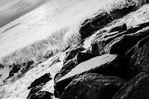 Waves on rocks Stock Photos