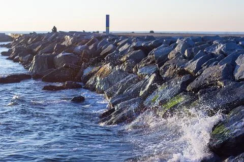 Waves on rocks Stock Photos