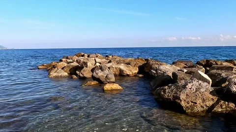 Waves on the rocks at the seaside in Liguria Stock Footage 318375250