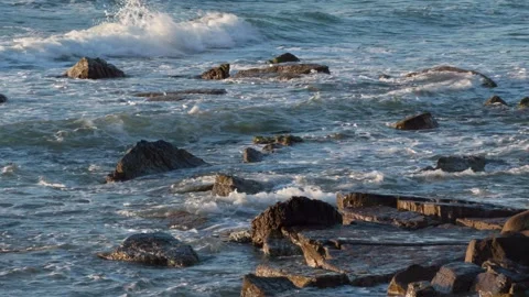 Waves on rocks at sunset in Cilento Video stock 255794918