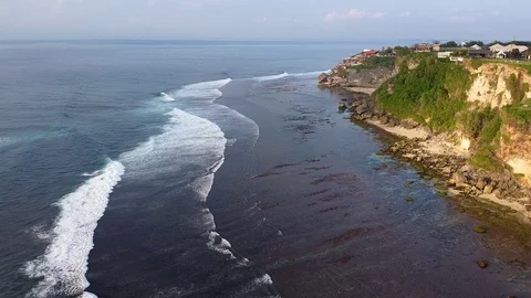 Waves in the rocks top view video shooting aerial Bali Bukit 库存影片 126975553