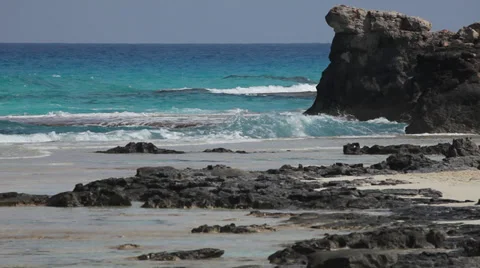 Waves on the rocks, turquoise water, Marsa Matruh, Egypt Stock Footage 38870390