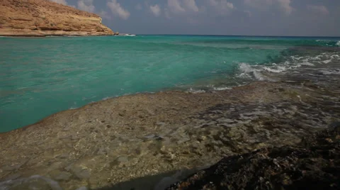 Waves on the rocks, turquoise water, Marsa Matruh, Egypt Stock Footage 38871727