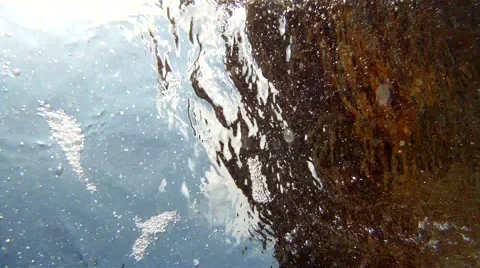 Waves on the rocks, underwater shot Stock Footage 47901487