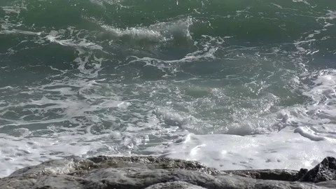 Waves rocks white water foam Stock Footage 74699548