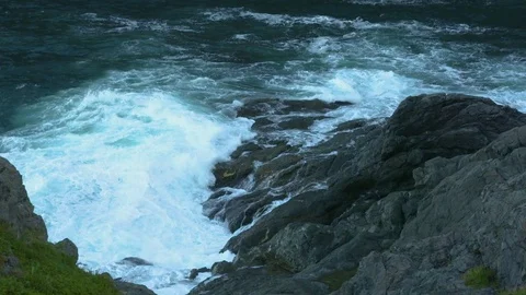 Waves on Rocks WS Slow Motion Stock Footage 83372071