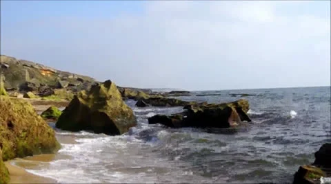Waves on rocks x264 Stock Footage 25822795