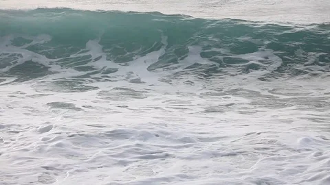 The waves on the rocky beach close up view Video stock 87657994