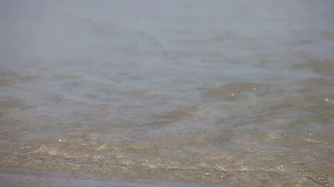 The waves on the rocky beach close up view Stock Footage 87658074