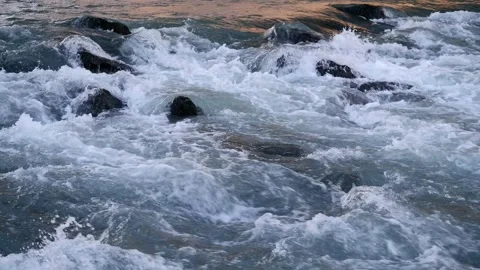 Waves on a rocky beach Stock Footage 171404919