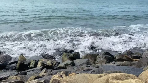 Waves on the rocky beach Stock Footage 305917424