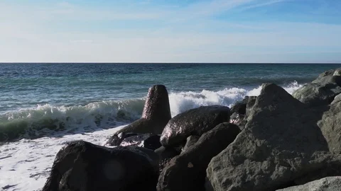 Waves on the rocky coast. Slow-motion Stock Footage 124222347
