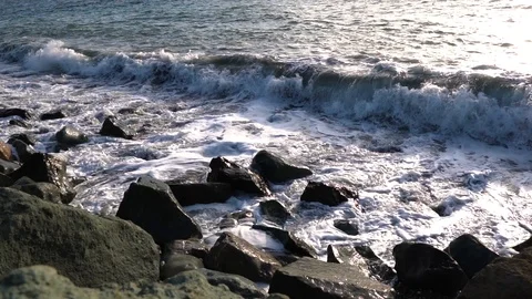 Waves on the rocky coast. Slow-motion Stock Footage 124222463