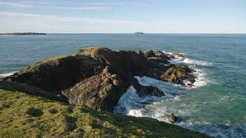 Waves on rocky outcrop Stock Footage 298341795