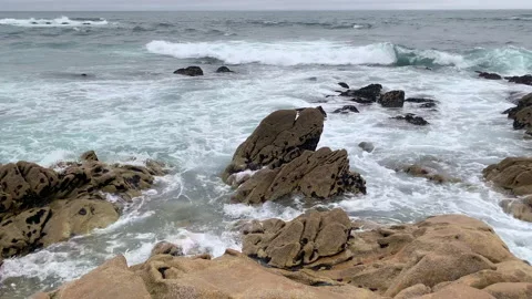 Waves on rocky shore of beach in Spring, Atlantic coast of Portugal. Stock Footage 239791746