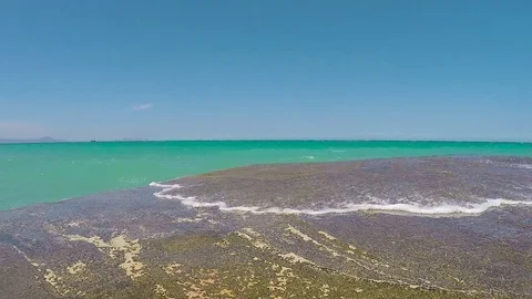 Waves on a rocky shore Video stock 71535274