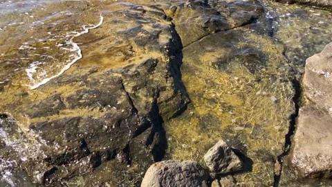 Waves on a rocky shore Stock Footage 139971759
