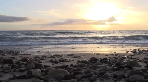 Waves on The Rocky Shore At Sunset Stock Footage 49751782