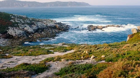 The waves on the rocky summer beach, Spain Stock Footage 88104730