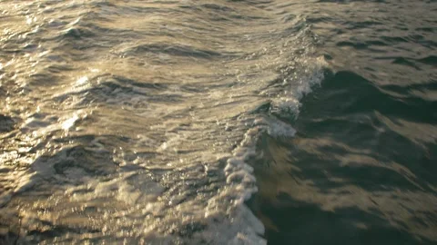 Waves roll by on the back of a boat off Dubrovnik, in Croatia Stock Footage 241659100