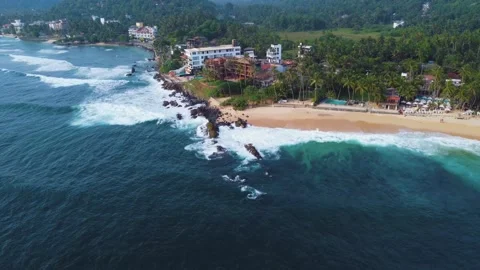 Waves roll onto the beach, srilanki, sand, spray, rocks, 4k Stock Footage 274150116