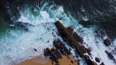 Waves roll onto the beach, srilanki, sand, spray, rocks, 4k Video stock 274150119